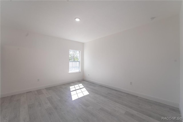 572 W Bluster Pl, Citrus Springs, FL 34434 - spare room featuring light wood finished floors and baseboards