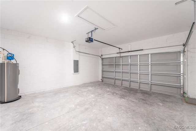 572 W Bluster Pl, Citrus Springs, FL 34434 - garage featuring a garage door opener, water heater, electric panel, and concrete block wall