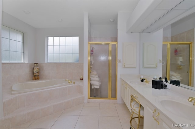 bathroom featuring tile patterned flooring, vanity, and independent shower and bath