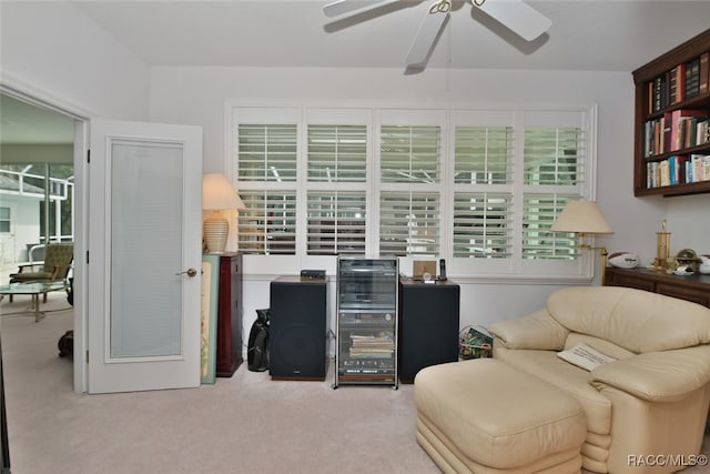 sitting room with light colored carpet