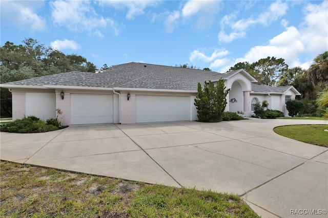 view of front of property featuring a garage