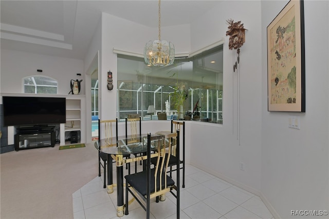 carpeted dining space with an inviting chandelier