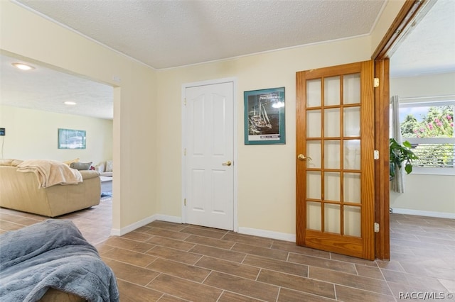 foyer featuring a textured ceiling