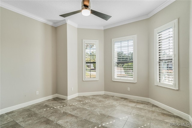 spare room with ornamental molding and ceiling fan