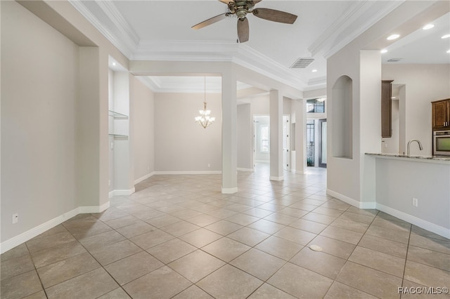 unfurnished room featuring ceiling fan with notable chandelier, sink, light tile patterned floors, and crown molding