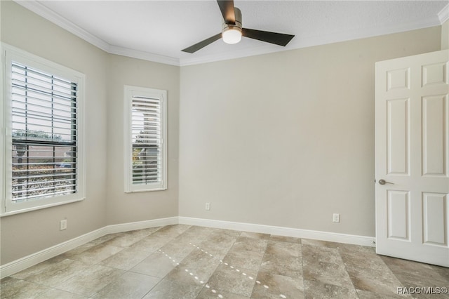 unfurnished room featuring ceiling fan and ornamental molding