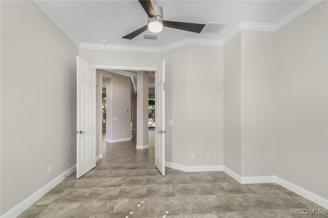 spare room with ceiling fan and ornamental molding