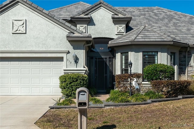 view of front of home with a garage