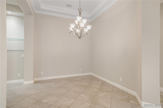 tiled spare room featuring an inviting chandelier, a raised ceiling, and crown molding