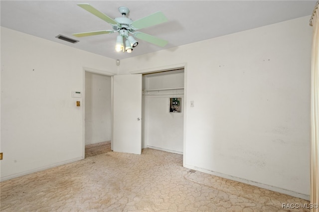 unfurnished bedroom with ceiling fan, a closet, and light colored carpet