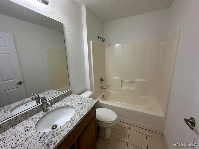 full bathroom featuring toilet, tile patterned floors, vanity, and shower / washtub combination