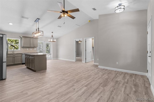 kitchen with ceiling fan with notable chandelier, gray cabinets, and visible vents