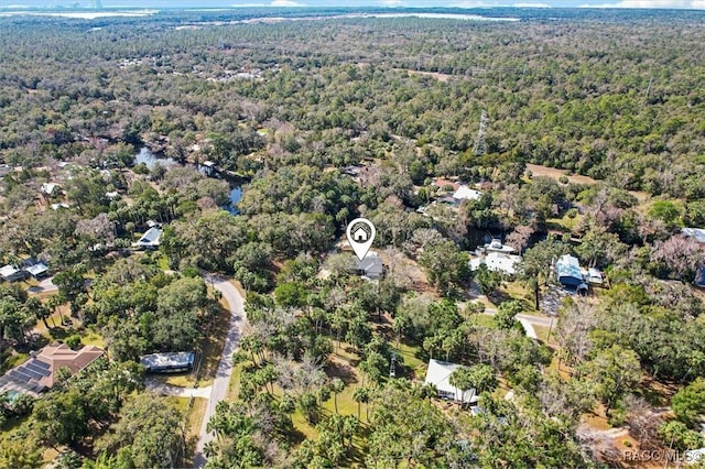 drone / aerial view with a view of trees