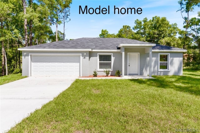 ranch-style home with a garage and a front lawn