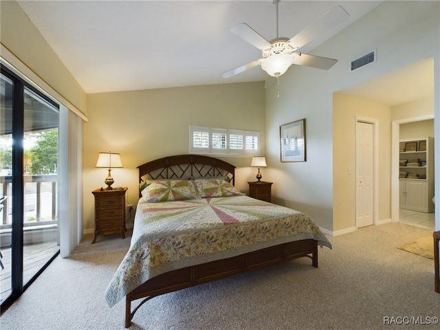 carpeted bedroom with access to outside, ceiling fan, a closet, and high vaulted ceiling