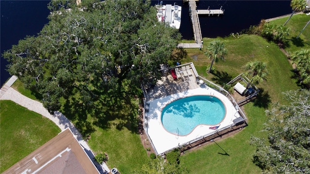 birds eye view of property featuring a water view