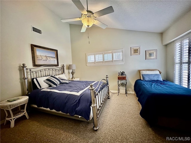 carpeted bedroom featuring a textured ceiling, ceiling fan, and lofted ceiling