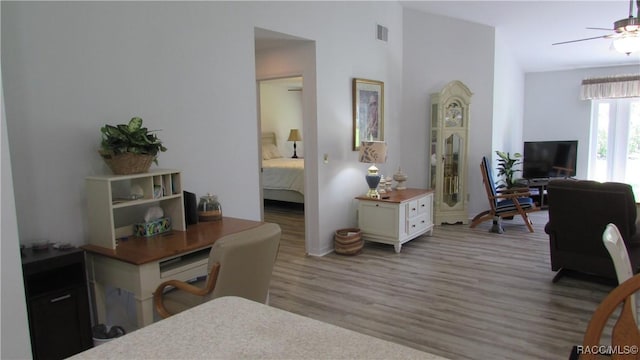 bedroom with visible vents and wood finished floors
