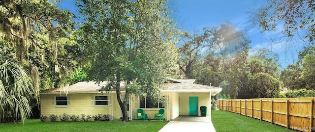 795 N Appalachian Ter, Crystal River, FL 34429 - view of front of property featuring concrete driveway, a carport, and a shingled roof