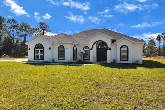 view of front of home with a front yard