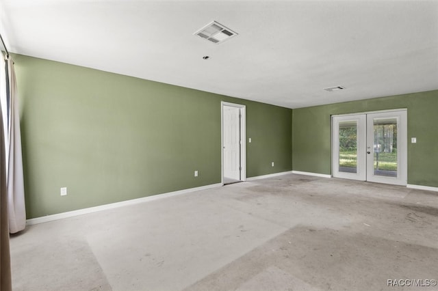 empty room featuring french doors