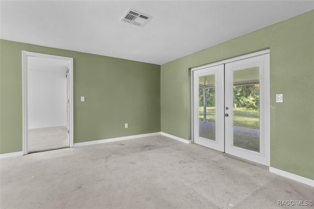 spare room with french doors