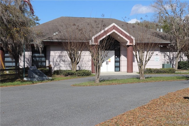 view of front of home featuring cooling unit