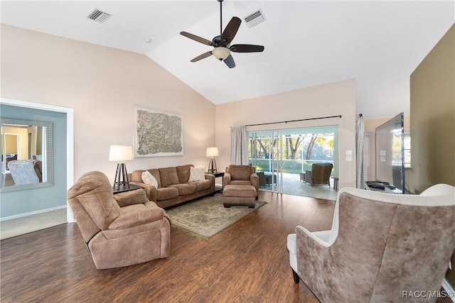 living room with vaulted ceiling, ceiling fan, and dark hardwood / wood-style floors