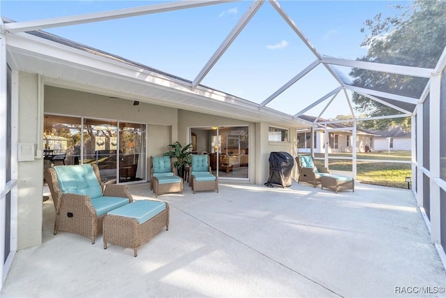 sunroom featuring lofted ceiling