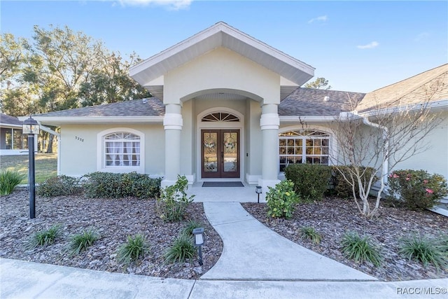 doorway to property with french doors