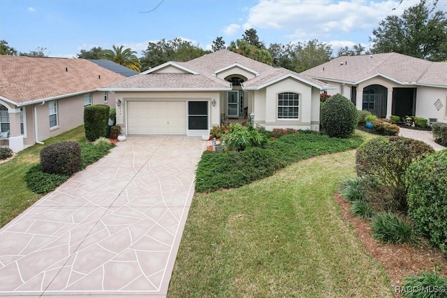 ranch-style home featuring a garage and a front yard