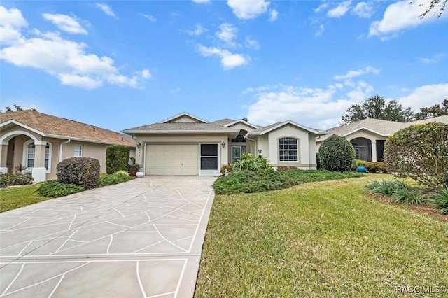 single story home featuring a garage and a front yard