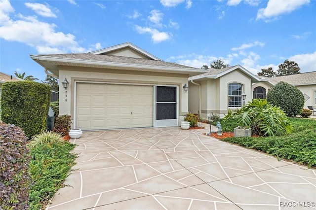 ranch-style home featuring a garage