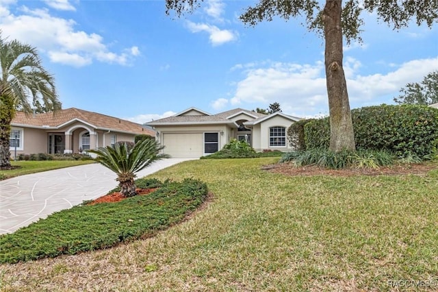 single story home with a garage and a front yard