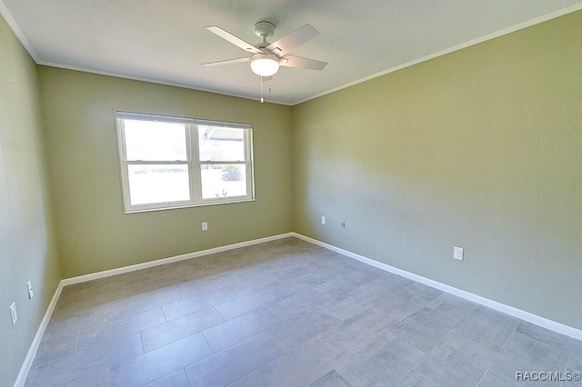 empty room with ornamental molding and ceiling fan