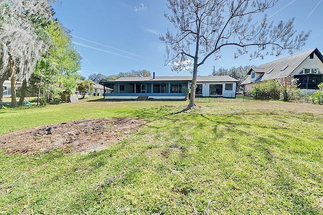 ranch-style house with a front yard