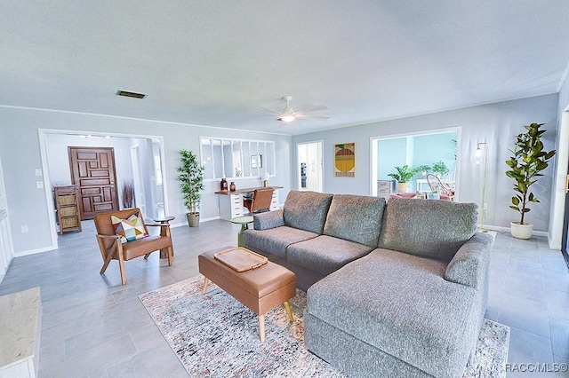 living room with ceiling fan