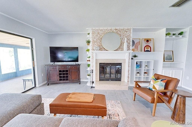 living room with ornamental molding