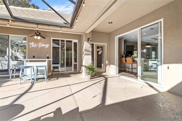 view of patio with ceiling fan