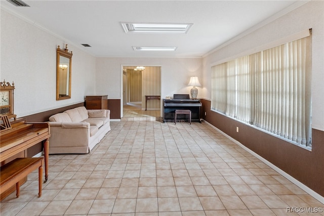 living room with crown molding and light tile patterned floors