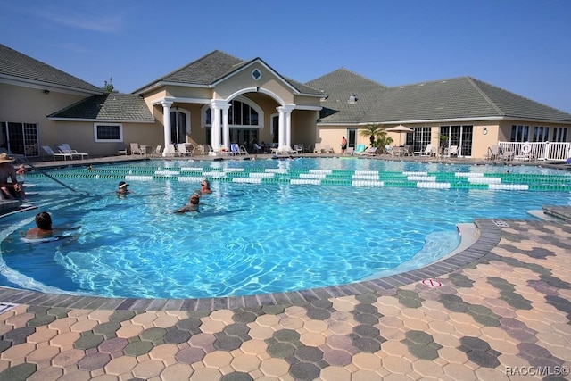 pool featuring a patio area