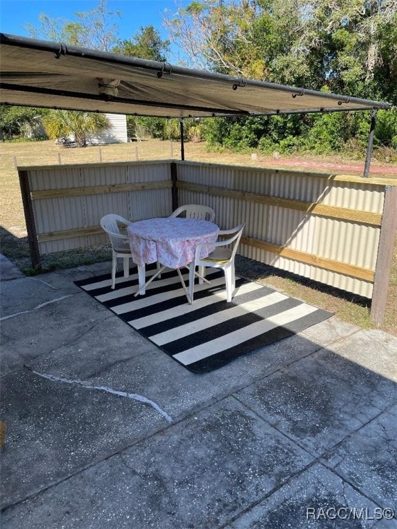 6353 Spring Hill Dr, Spring Hill, FL 34606 - view of patio / terrace featuring outdoor dining space