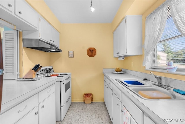 kitchen with white electric stove, white cabinetry, and sink