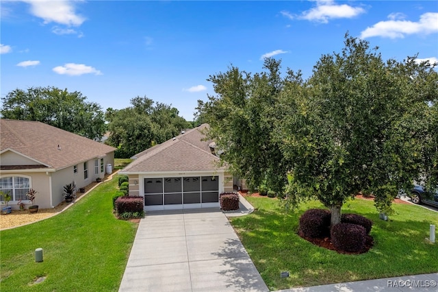 4614 N Webster Island Ter, Hernando, FL 34442 - view of front of house with driveway, a garage, a front lawn, and stucco siding