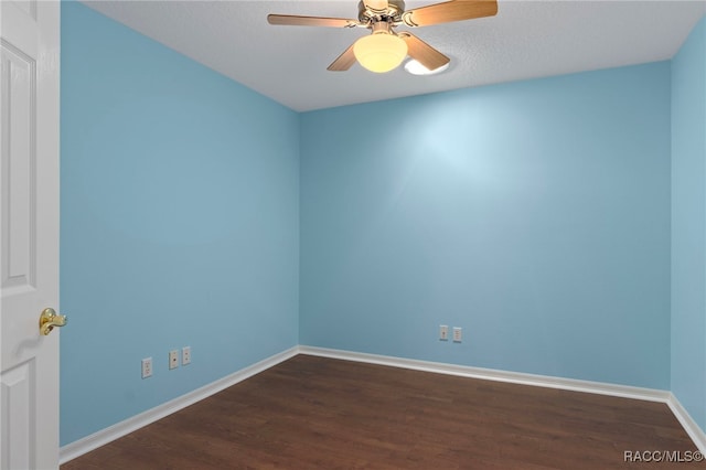 4614 N Webster Island Ter, Hernando, FL 34442 - empty room with dark wood-style floors and a ceiling fan