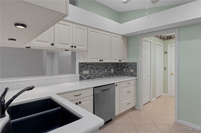 4614 N Webster Island Ter, Hernando, FL 34442 - kitchen featuring stainless steel dishwasher, light tile patterned floors, white cabinets, and light countertops