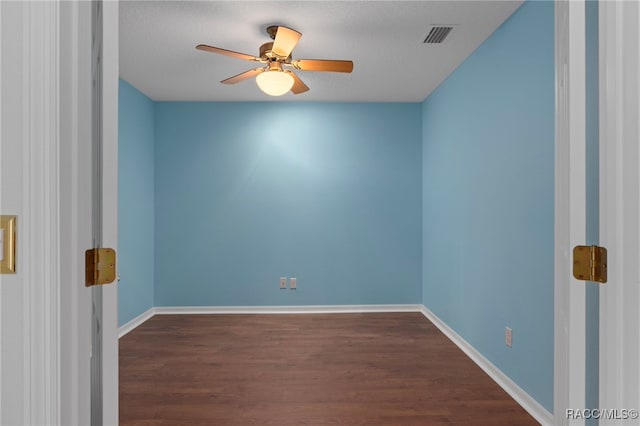 4614 N Webster Island Ter, Hernando, FL 34442 - spare room featuring ceiling fan and dark wood-type flooring
