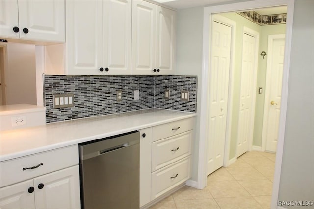 4614 N Webster Island Ter, Hernando, FL 34442 - kitchen featuring stainless steel dishwasher, decorative backsplash, light tile patterned floors, and light countertops