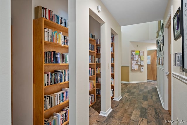 4614 N Webster Island Ter, Hernando, FL 34442 - hallway featuring dark wood-style floors and baseboards