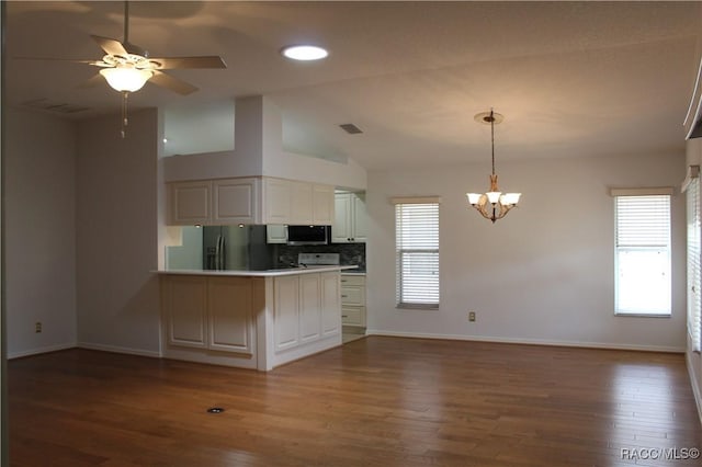 4614 N Webster Island Ter, Hernando, FL 34442 - kitchen with refrigerator with ice dispenser, a peninsula, stainless steel microwave, ceiling fan, and plenty of natural light